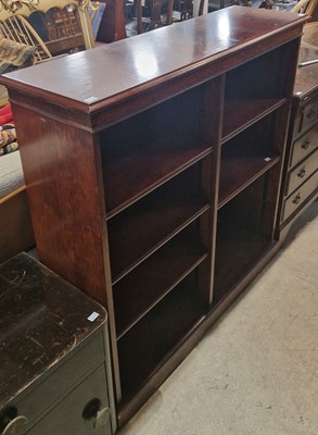 Lot 731 - A reproduction mahogany open bookcase with...