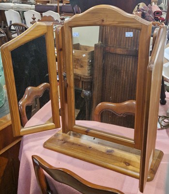 Lot 738 - A pine triple plate dressing table mirror.