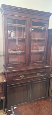 Lot 721 - A late 19th century mahogany secretaire...