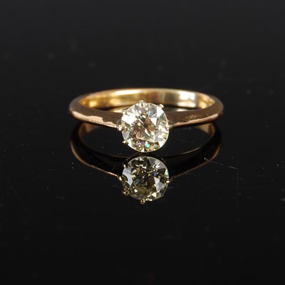 Lot 310 - A yellow metal solitaire diamond ring, set...