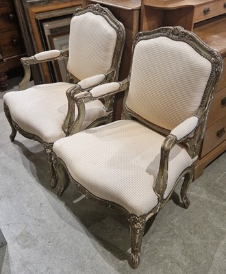 Lot 774 - A pair of green painted upholstered fauteuil...