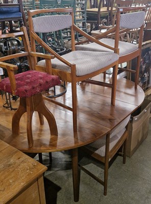 Lot 777 - A mid-century teak extending dining table,...