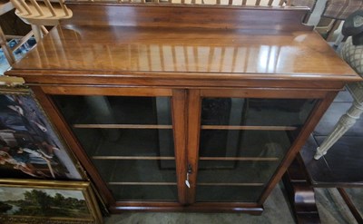 Lot 780 - Early 20th century mahogany glazed two-door...