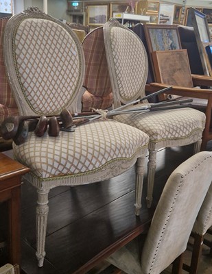 Lot 783 - A pair of painted upholstered fauteuil style...