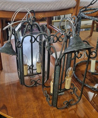 Lot 795 - A four-light hanging lantern in patinated...