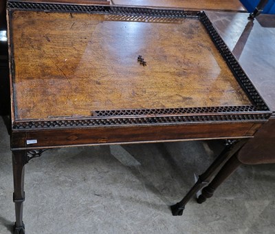 Lot 859 - A George III mahogany silver table, the...