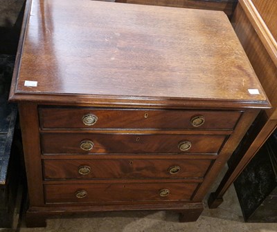 Lot 867 - A reproduction mahogany bachelors chest,...