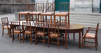 Lot 884 - A mahogany drop-leaf dining table comprising...