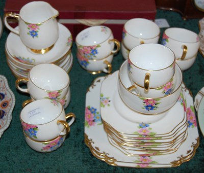 Lot 350 - A Carlton China floral decorated part teaset.