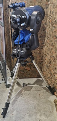 Lot 918 - A Meade LX 200GPS SMT telescope on tripod stand.