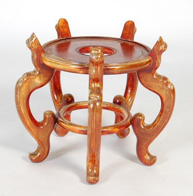 Lot 94 - A Chinese redwood urn stand, 20th century, the...