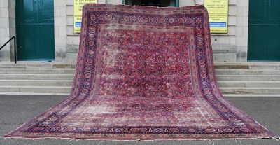 Lot 920 - A large Persian carpet, early 20th century,...