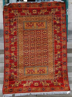 Lot 935 - A 20th century silk rug, the rectangular field...