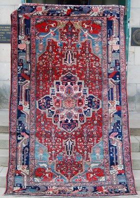 Lot 944 - A Persian rug, 20th century, the rectangular...