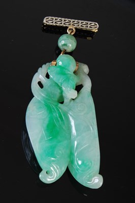 Lot 37D - A Chinese yellow and white metal mounted jade...