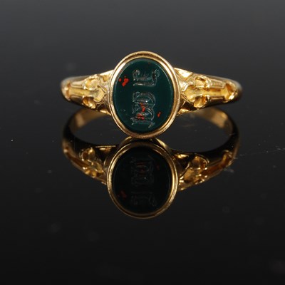 Lot 310A - A Victorian yellow metal signet ring, set with...