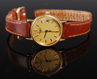 Lot 84C - A ladies' Longines yellow metal cased quartz...