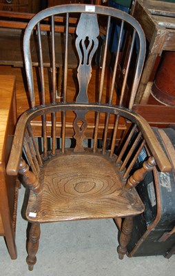 Lot 637 - A 19th century elm Windsor chair