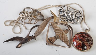 Lot 84K - Six assorted silver brooches by Ola M Gorie,...