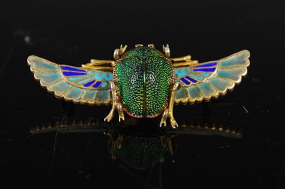 Lot 310H - A gilt metal and plique-à-jour enamel winged...