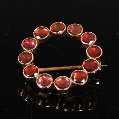 Lot 310J - An Edwardian yellow metal and hessonite garnet...