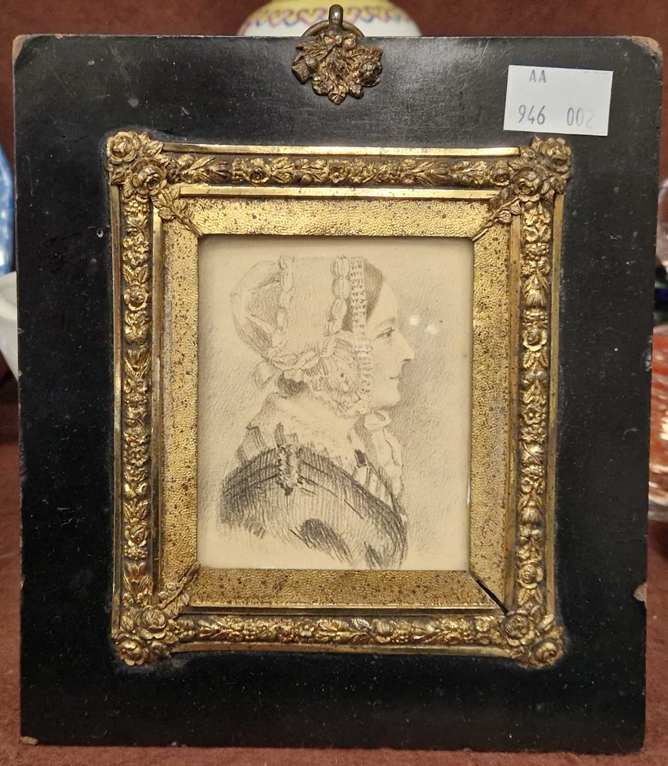 Lot 79 - A 19th century portrait miniature profile...
