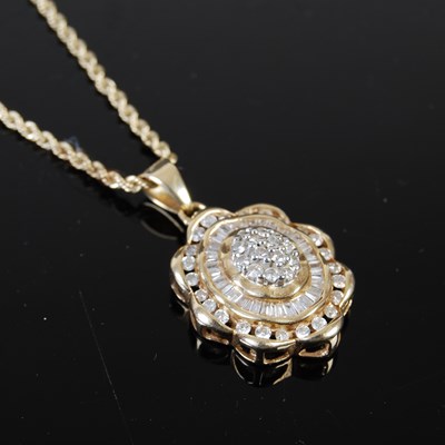 Lot 43F - A yellow metal and diamond chip pendant and...