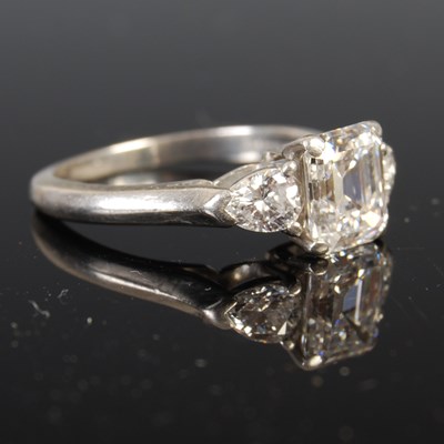 Lot 43 - A white metal and diamond three stone ring,...