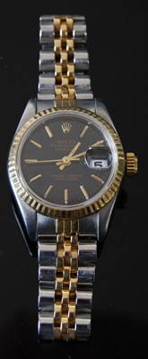 Lot 43J - A ladies 18ct gold and stainless steel Rolex...