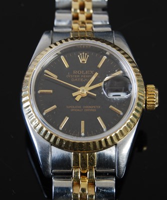 Lot 43 - A ladies 18ct gold and stainless steel Rolex...