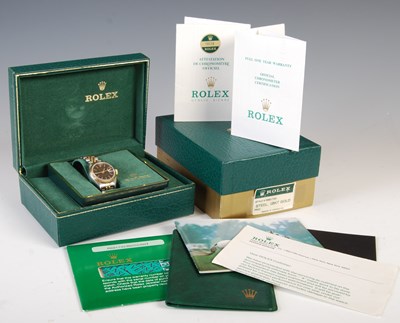 Lot 43 - A ladies 18ct gold and stainless steel Rolex...