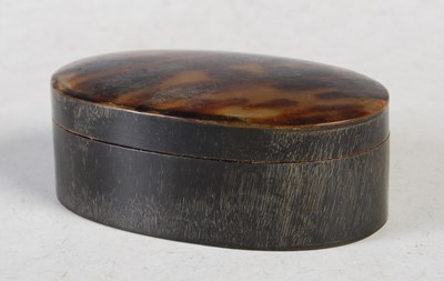 Lot 276 - A 19th century tortoiseshell plain oval snuff...