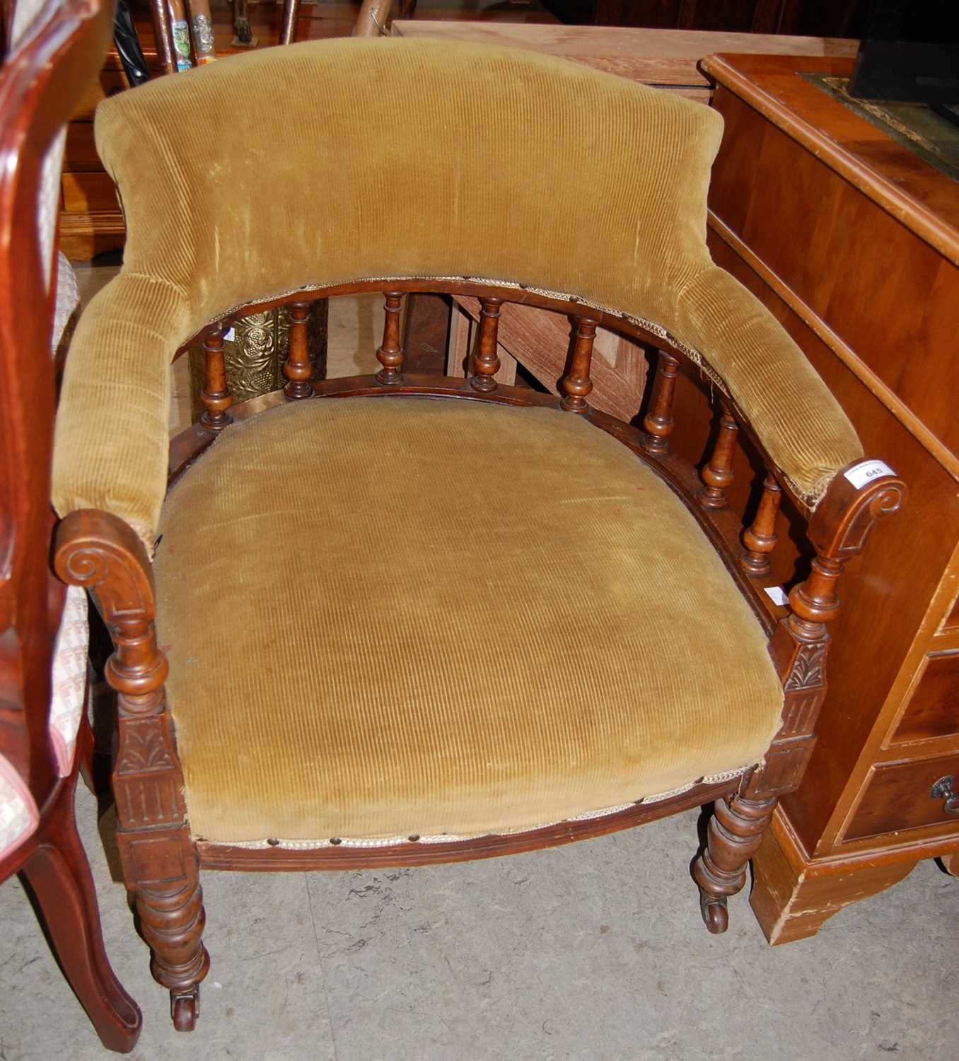 Lot 645 - A 19th century tub chair with green corded...