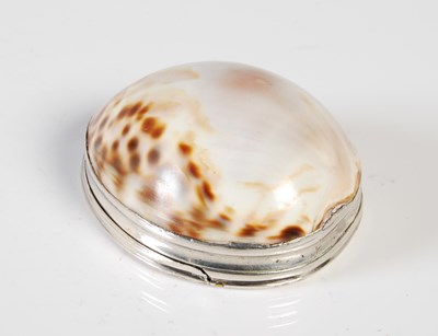 Lot 264 - A mid-18th century silver mounted cowrie shell...