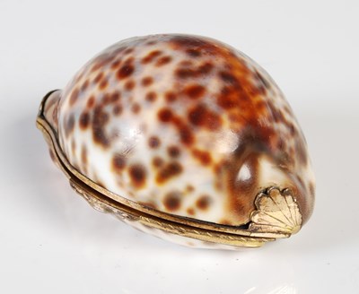 Lot 279 - A late 18th century cowrie shell snuff box,...