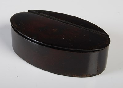 Lot 287 - A leather oval snuff box, with three-quarter...