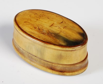 Lot 312 - An 18th century blonde horn oval snuff box,...