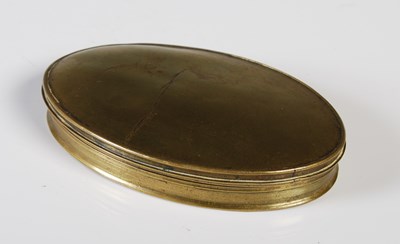 Lot 370 - An early 19th century brass oval snuff box,...