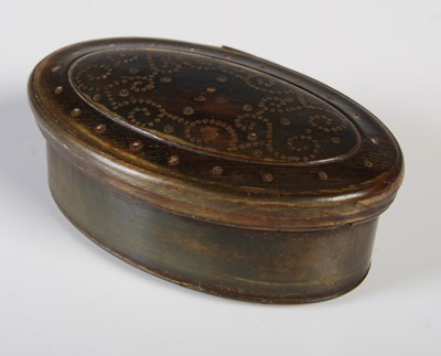 Lot 299 - A late 18th century horn oval snuff box, the...