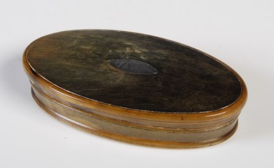 Lot 292 - A late 18th century horn oval snuff box, the...