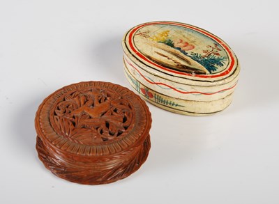 Lot 253 - A carved wood circular box, with screw-off...