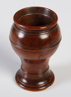 Lot 354 - An early 19th century treen baluster snuff...