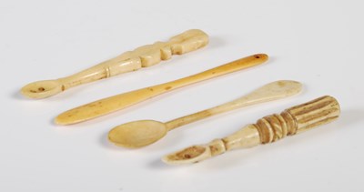 Lot 300 - Four 19th century bone snuff spoons,...