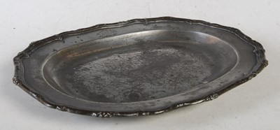 Lot 347 - An 18th century pewter oval ashet with shaped...