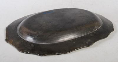 Lot 347 - An 18th century pewter oval ashet with shaped...