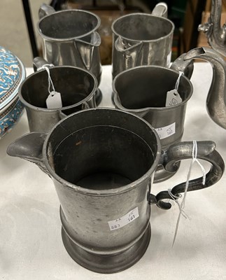 Lot 332 - A late 18th century pewter measuring jug,...