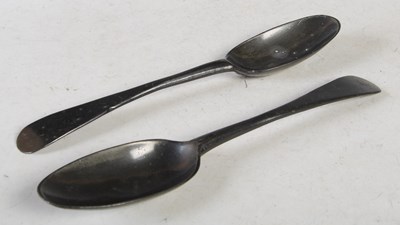 Lot 136 - Two 18th century pewter tablespoons with shell-...