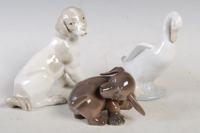 Lot 6 - A Royal Copenhagen porcelain model of a puppy,...