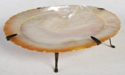 Lot 18 - A white metal mounted mother-of-pearl shell...