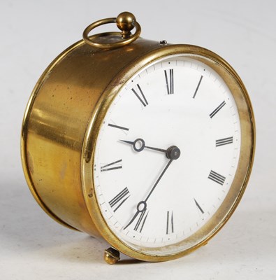 Lot 31 - A brass cased cylindrical desk clock with...